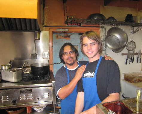 Dennis Apodaca (pictured at right), one of Albuquerque's best chefs A serious, self-effacing chef, Dennis Apodaca (rear) finds time to clown around with a staff member.