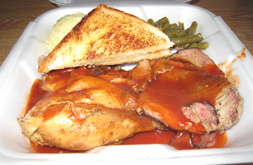Barbecue chicken, pork brisket, Texas toast, green beans and potato salad.