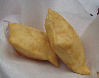 Sopaipillas at La Placita Dining Rooms are delicious, puffy, golden brown.