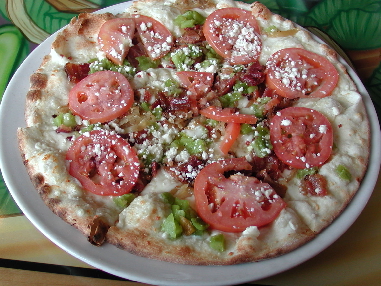 Scarpa's cheesy bacon pizza is an example of a good thin-crust pizza.