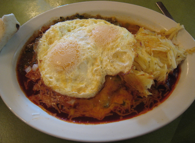 Breakfast Enchiladas with two fried eggs