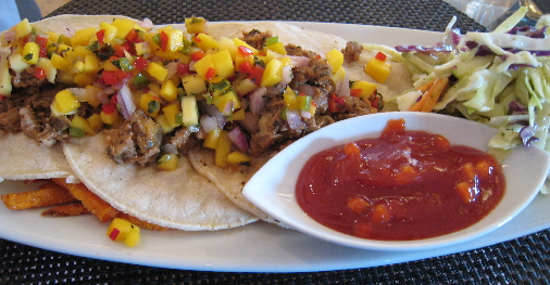 Pomegranate BBQ duck taquitos