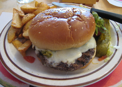 Green chile cheeseburger with home fries