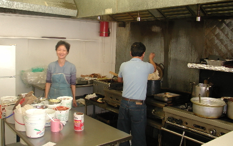 Lucky Boy's genial proprietors hard at work.