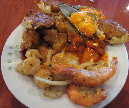 The buffet features several seafood items