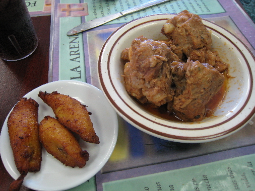 Fried plantains and Fricase de Puerco.