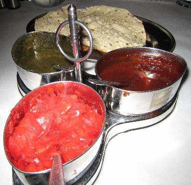 Three complementary chutneys accompany every dinner meal: onion, tamarind and mint.