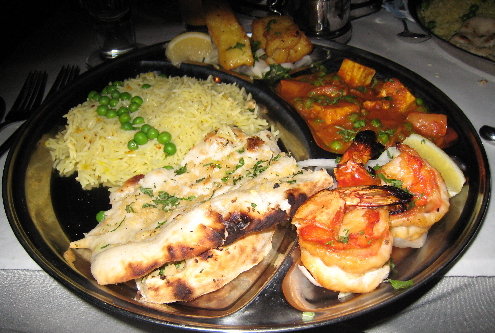 A "combination plate" featuring outstanding Indian cuisine.