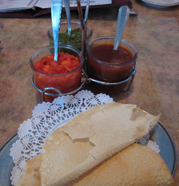 Preprandial pleasure: tamarind, onion and mint chutneys.