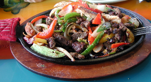 Fajitas Bravas, a combination of chicken and beef served with grilled vegetables.