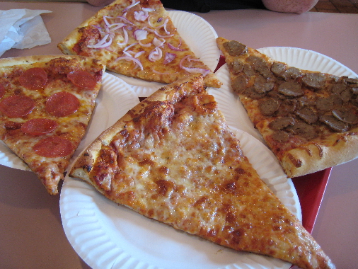 Four slices of Saggio's pizza.
