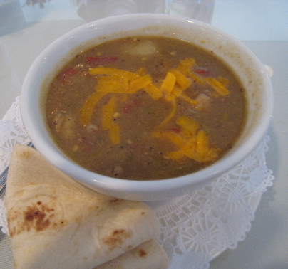 Green chile stew: a bit less cumin and more green chile and it would be great!