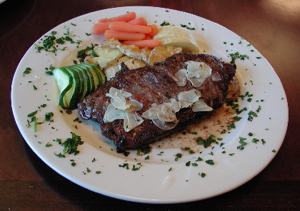 The New York steak with scallopped potatoes.