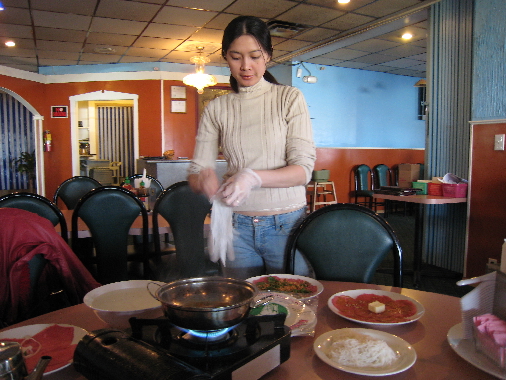 The lovely Toa Kim prepares seven courses of beef tableside
