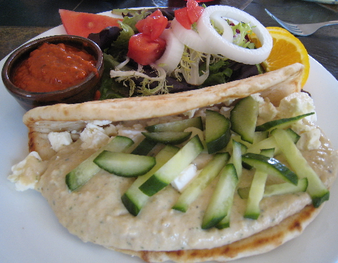 Hummus pita with feta and harissa