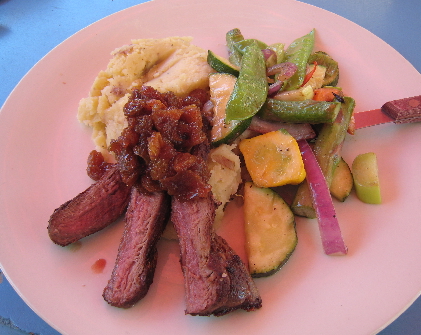 Tenderloin of wild bor served with a pear and golden sultana chutney