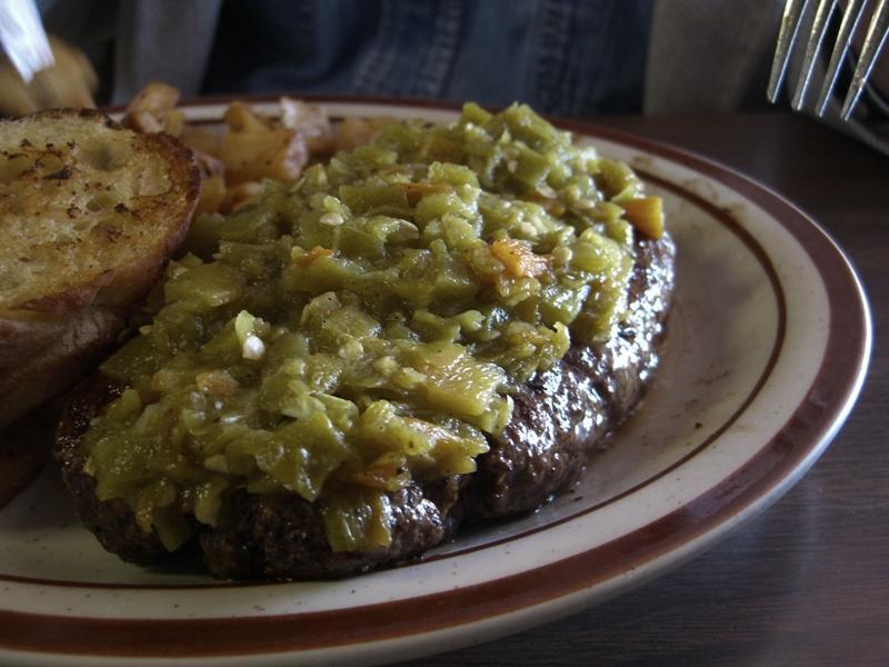 The Bobcat Bite's hamburger steak with green chile.