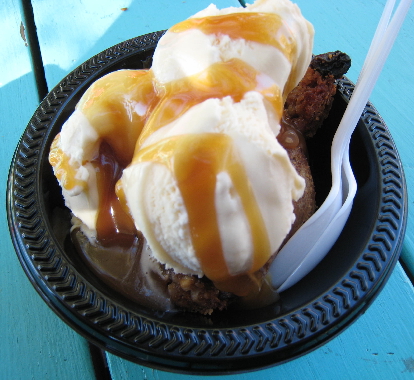 Apple crisp with vanilla ice cream and caramel topping.