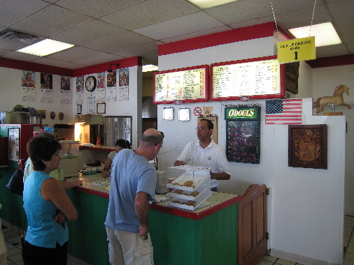 Felipe Martinez behind the cash register