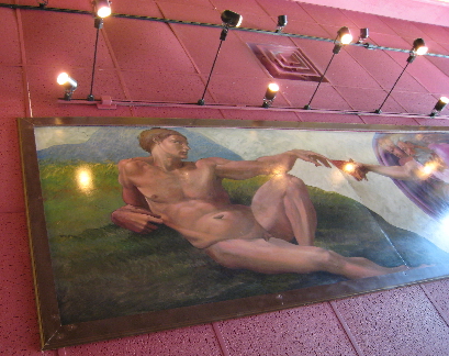 The Creation of Adam festoons the ceiling