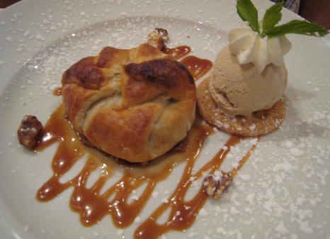 Rustic apple tart with caramel sauce, candied walnuts and cinammon ice cream